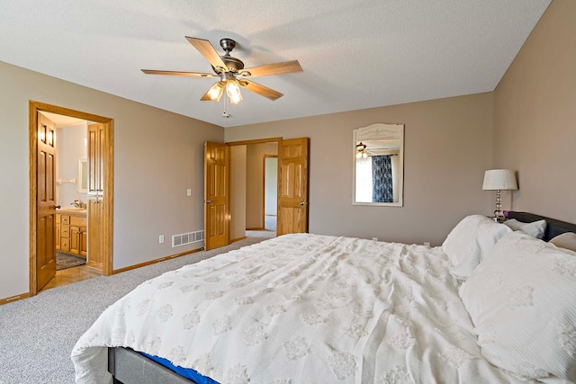 5901 106th Ave N, Brooklyn Park, MN 55443 - bedroom featuring carpet floors, a ceiling fan, and connected bathroom