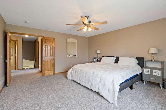 5901 106th Ave N, Brooklyn Park, MN 55443 - carpeted bedroom featuring baseboards and ceiling fan