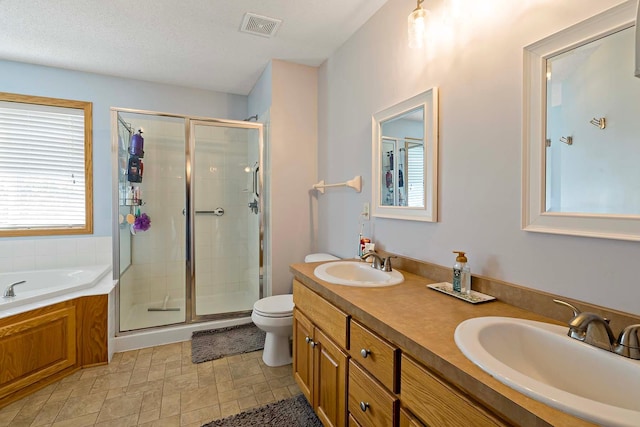 5901 106th Ave N, Brooklyn Park, MN 55443 - bathroom featuring a stall shower, double vanity, and a bath