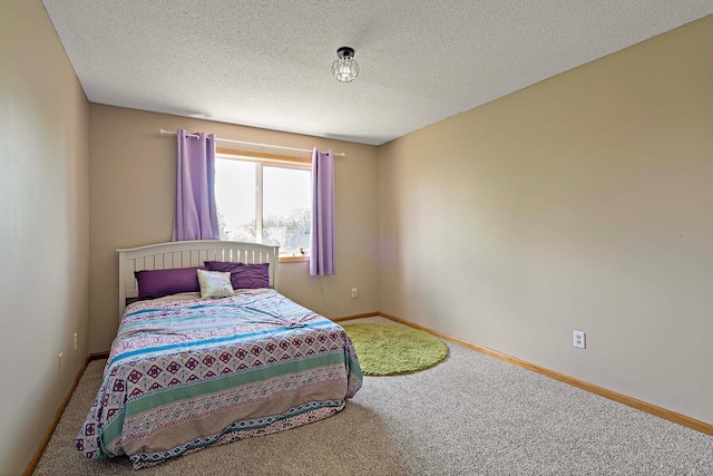 5901 106th Ave N, Brooklyn Park, MN 55443 - bedroom featuring carpet flooring and a textured ceiling