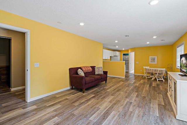5901 106th Ave N, Brooklyn Park, MN 55443 - living area featuring wood finished floors and recessed lighting