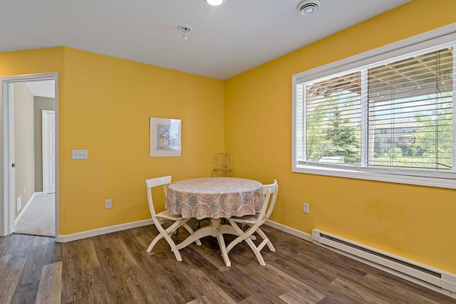 5901 106th Ave N, Brooklyn Park, MN 55443 - dining area with a baseboard radiator and wood finished floors