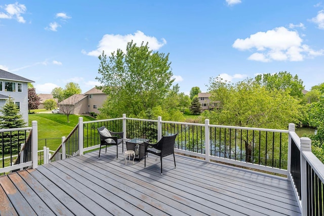 5901 106th Ave N, Brooklyn Park, MN 55443 - deck featuring a yard