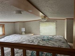 bedroom with a textured ceiling