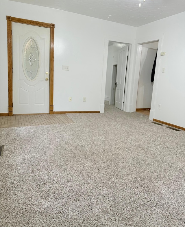 441 Minnesota Ave, Big Lake, MN 55309 - foyer featuring baseboards and light colored carpet