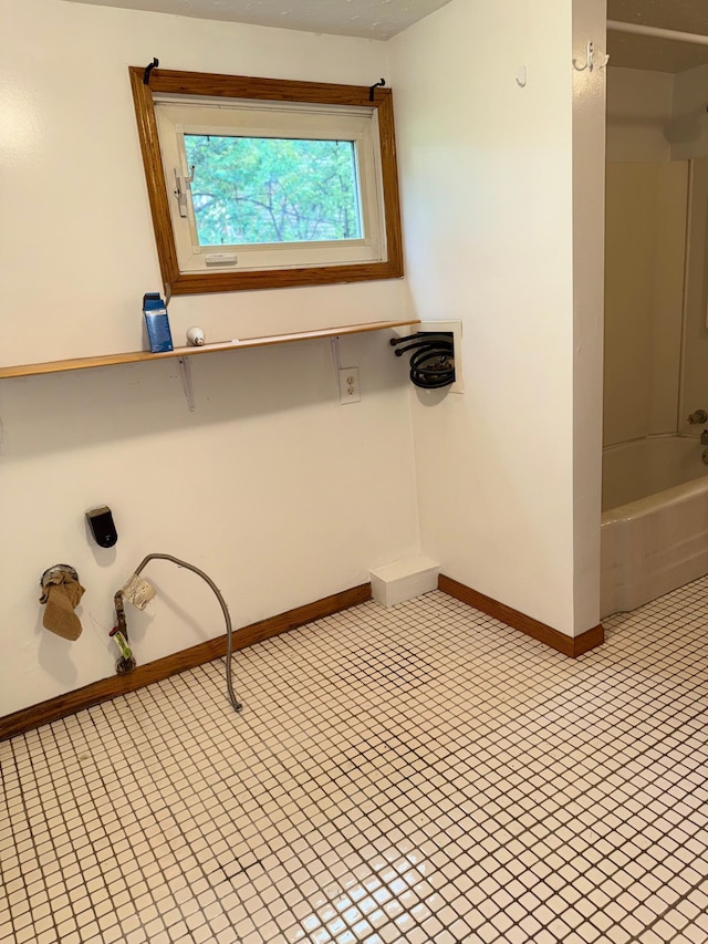 441 Minnesota Ave, Big Lake, MN 55309 - full bathroom with baseboards, tub / shower combination, and tile patterned flooring