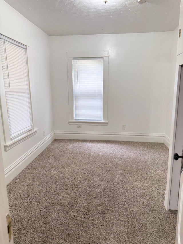 441 Minnesota Ave, Big Lake, MN 55309 - unfurnished room featuring carpet and baseboards