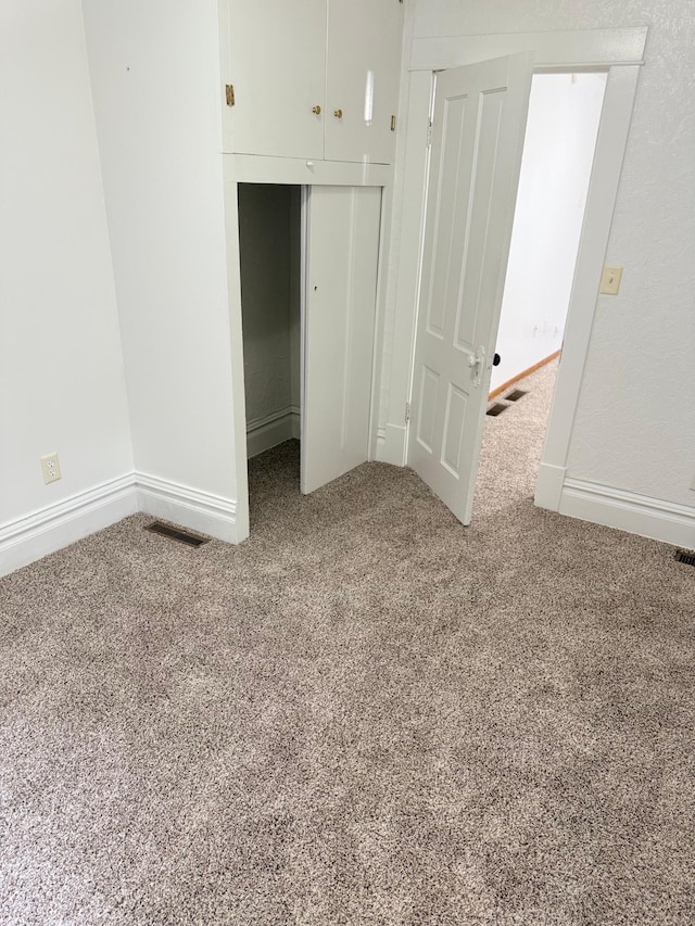 441 Minnesota Ave, Big Lake, MN 55309 - unfurnished bedroom featuring carpet, a closet, and baseboards