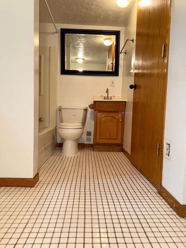 441 Minnesota Ave, Big Lake, MN 55309 - full bathroom with baseboards, shower / bathtub combination, vanity, toilet, and a textured ceiling