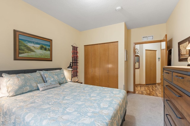 2565 Franklin Ave Unit 211, Saint Paul, MN 55114 - bedroom with carpet and a closet