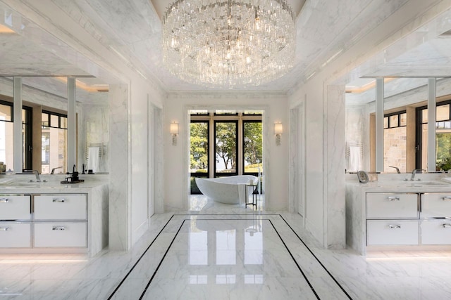 2770 Gale Rd, Woodland, MN 55391 - full bath featuring vanity, marble tiled flooring, crown molding, a soaking tub, and a chandelier