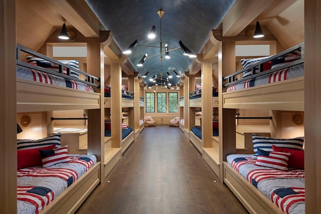 2770 Gale Rd, Woodland, MN 55391 - bedroom featuring vaulted ceiling, a chandelier, and wood finished floors
