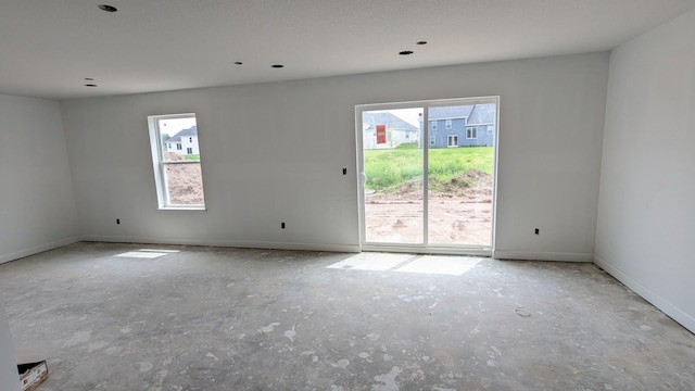 7869 41st St N, Oakdale, MN 55128 - unfurnished room featuring plenty of natural light