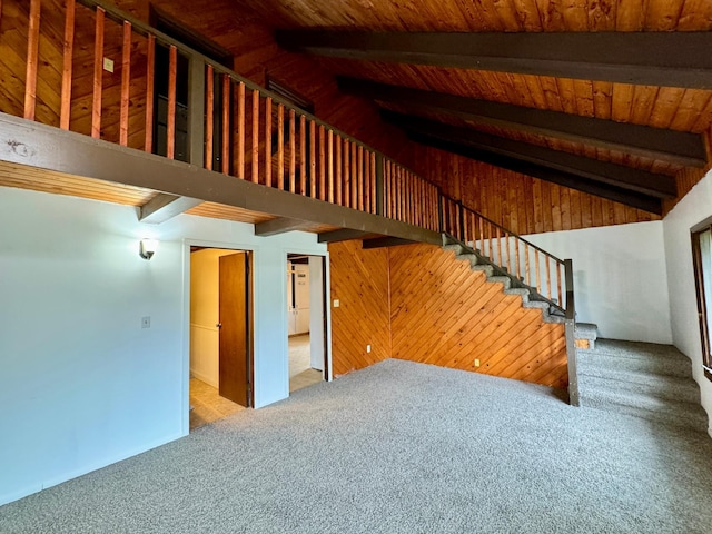 56279 350th St, Warroad, MN 56763 - stairway with carpet floors, beam ceiling, high vaulted ceiling, and wood ceiling
