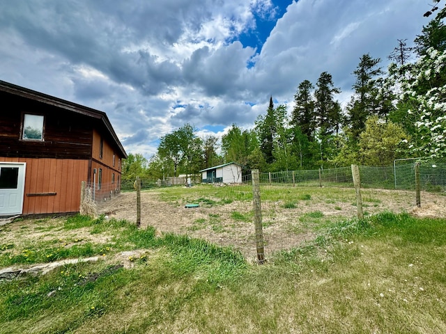 56279 350th St, Warroad, MN 56763 - view of yard with fence and an outbuilding
