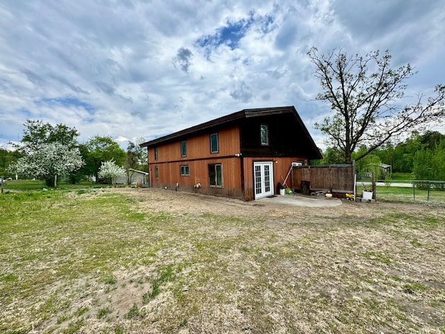 56279 350th St, Warroad, MN 56763 - rear view of property with french doors, fence, and a patio area