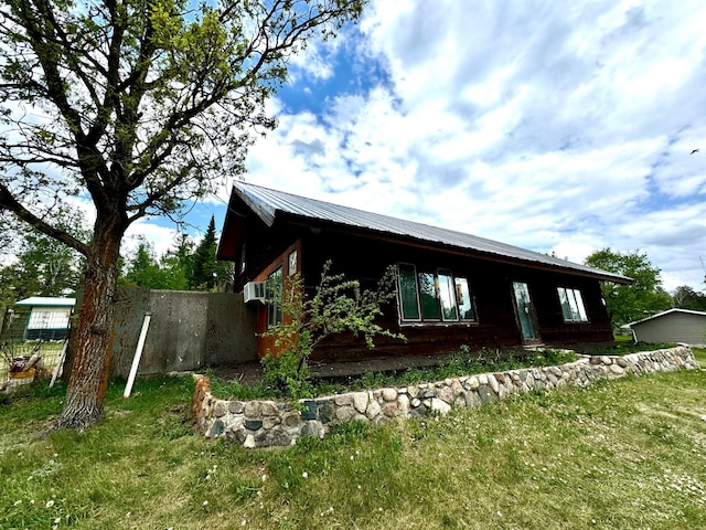 56279 350th St, Warroad, MN 56763 - view of home's exterior featuring metal roof