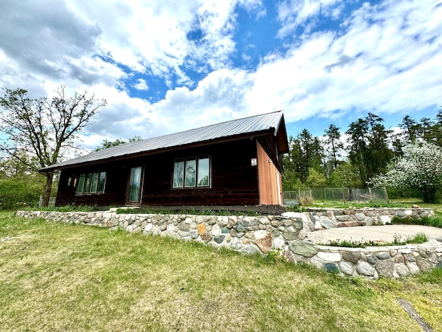 56279 350th St, Warroad, MN 56763 - view of home's exterior featuring metal roof