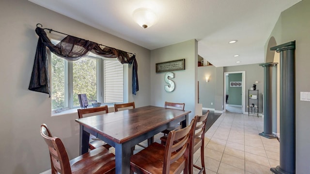 610 Main St, Adams, MN 55909 - dining room featuring light tile patterned floors, baseboards, and ornate columns