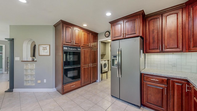 610 Main St, Adams, MN 55909 - kitchen featuring stainless steel fridge with ice dispenser, washer / dryer, backsplash, light tile patterned floors, and recessed lighting