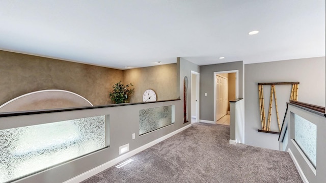 610 Main St, Adams, MN 55909 - hall featuring carpet floors, an upstairs landing, recessed lighting, and baseboards