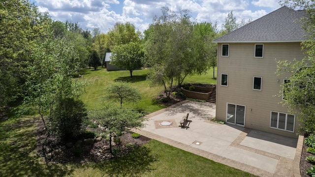610 Main St, Adams, MN 55909 - view of green lawn with a patio