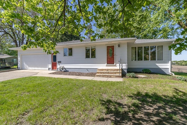 468 Washington St, Le Center, MN 56057 - ranch-style home with a garage, asphalt driveway, and a front yard