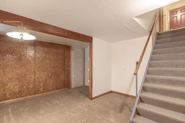 468 Washington St, Le Center, MN 56057 - stairway featuring carpet flooring and baseboards
