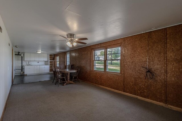 468 Washington St, Le Center, MN 56057 - dining area with carpet flooring, a ceiling fan, and baseboards