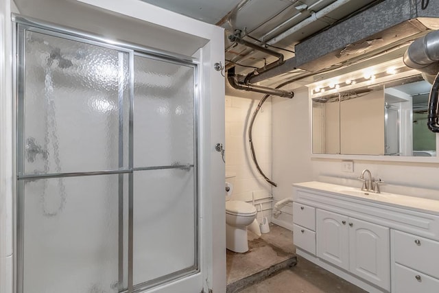 468 Washington St, Le Center, MN 56057 - bathroom with a stall shower, toilet, vanity, and concrete floors
