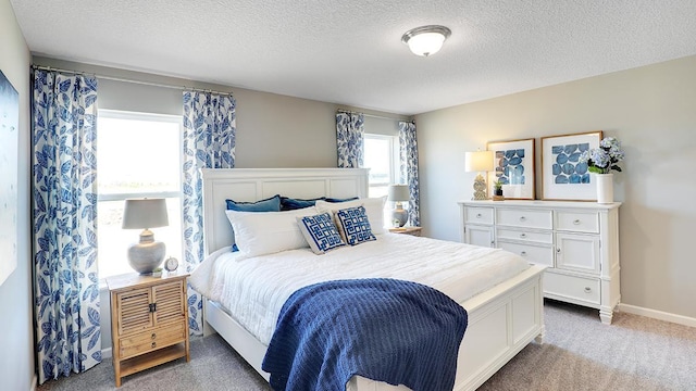 8852 Jorgensen Ave S, Cottage Grove, MN 55016 - carpeted bedroom with a textured ceiling and baseboards