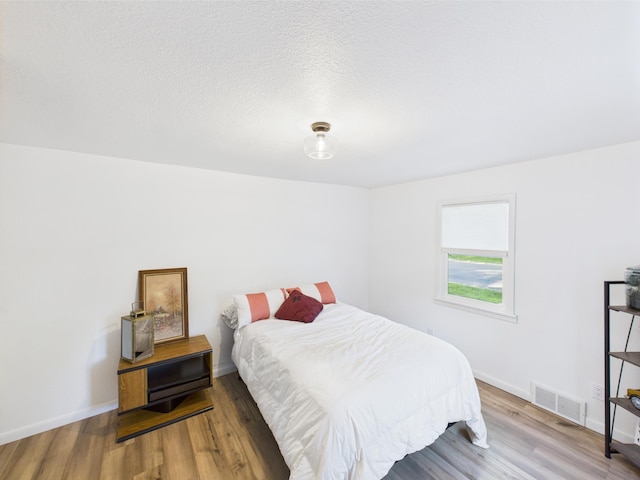 3502 3rd St N, Saint Cloud, MN 56303 - bedroom with wood finished floors and baseboards