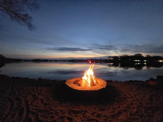 water view featuring an outdoor fire pit