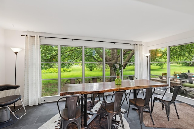 124 Paisley Ln, Golden Valley, MN 55422 - sunroom / solarium featuring healthy amount of natural light and outdoor dining space