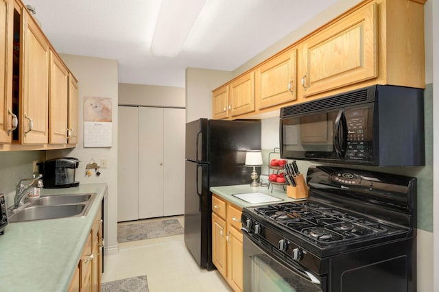 4201 Lakeside Ave N Unit 317, Brooklyn Center, MN 55429 - kitchen featuring black appliances, a sink, light countertops, and light brown cabinets