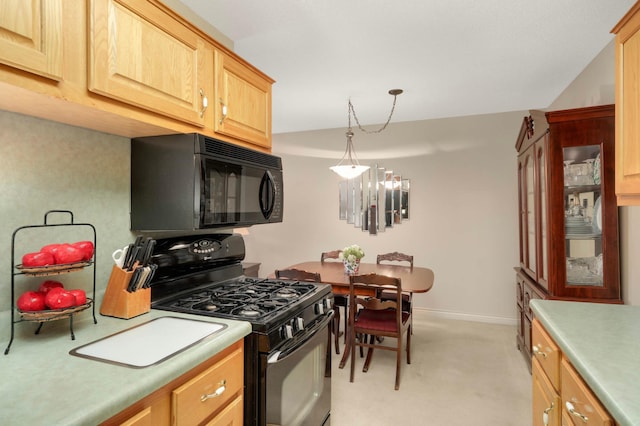 4201 Lakeside Ave N Unit 317, Brooklyn Center, MN 55429 - kitchen featuring black appliances, light countertops, light colored carpet, light brown cabinets, and hanging light fixtures