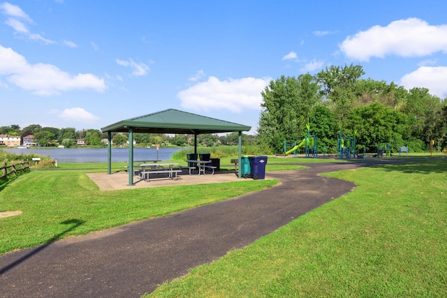 4201 Lakeside Ave N Unit 317, Brooklyn Center, MN 55429 - view of property's community featuring a gazebo, a water view, and a lawn