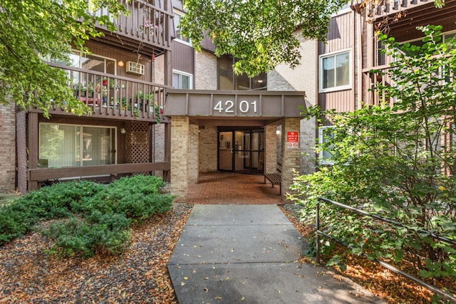4201 Lakeside Ave N Unit 317, Brooklyn Center, MN 55429 - property entrance featuring brick siding