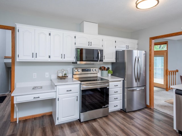7808 Sunkist Blvd, Brooklyn Park, MN 55444 - kitchen featuring appliances with stainless steel finishes, dark wood-type flooring, light countertops, and white cabinets