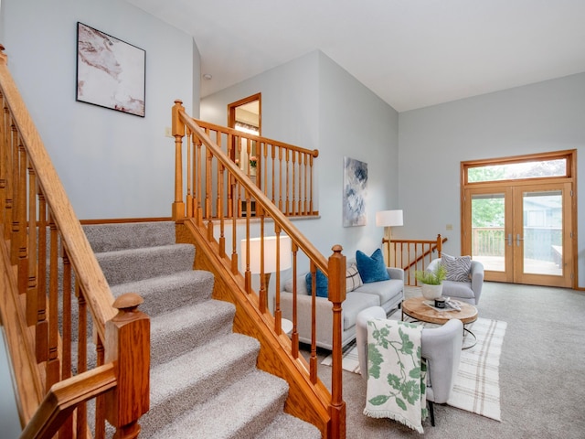 7808 Sunkist Blvd, Brooklyn Park, MN 55444 - stairway featuring french doors and carpet floors
