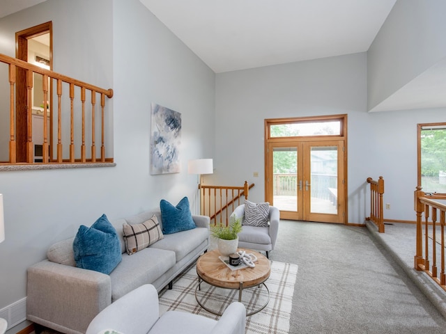 7808 Sunkist Blvd, Brooklyn Park, MN 55444 - living area with carpet, french doors, baseboards, and vaulted ceiling