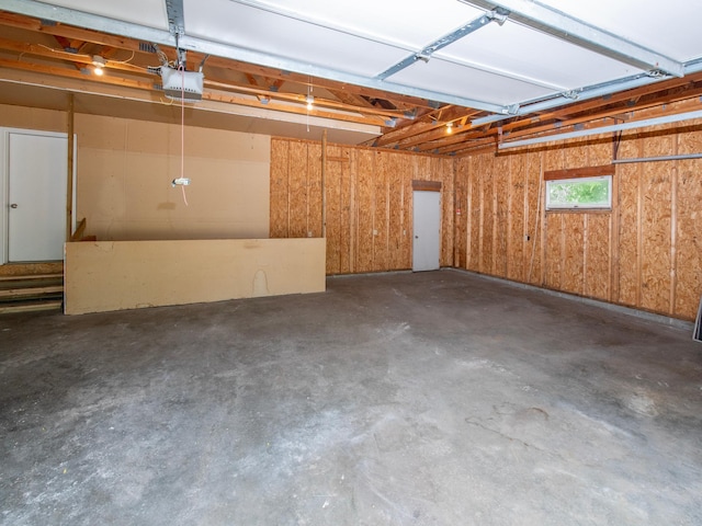 7808 Sunkist Blvd, Brooklyn Park, MN 55444 - garage featuring a garage door opener