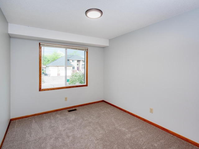 7808 Sunkist Blvd, Brooklyn Park, MN 55444 - carpeted empty room featuring baseboards