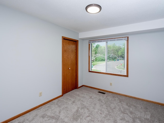 7808 Sunkist Blvd, Brooklyn Park, MN 55444 - carpeted spare room with baseboards