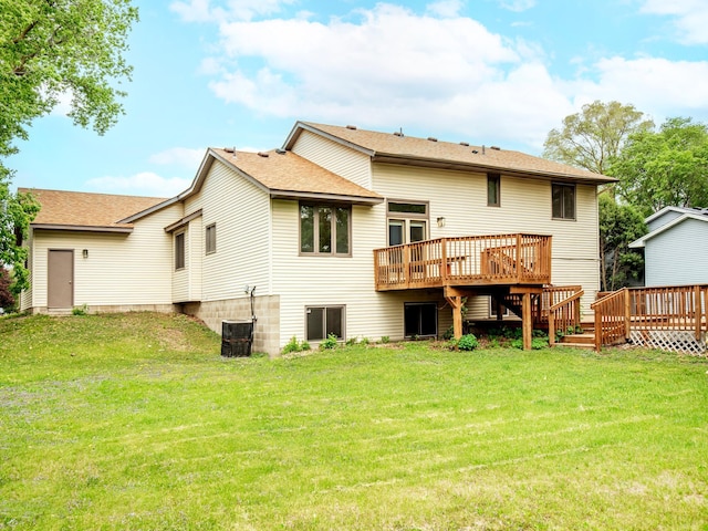 7808 Sunkist Blvd, Brooklyn Park, MN 55444 - back of property with a deck, a yard, central air condition unit, and stairway