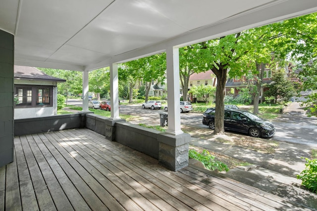 709 7th St SE, Minneapolis, MN 55414 - wooden deck featuring a porch