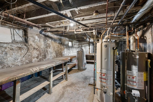 709 7th St SE, Minneapolis, MN 55414 - unfinished basement featuring gas water heater and a workshop area