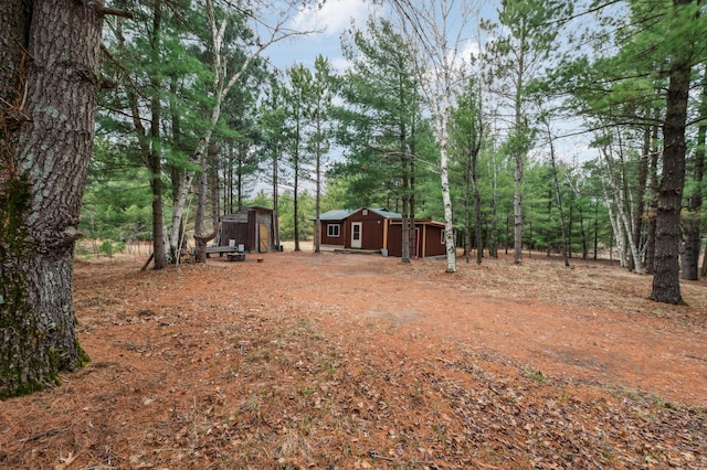 24625 Fosmo Dr, La Follette Twp, WI 54893 - view of yard with an outdoor structure