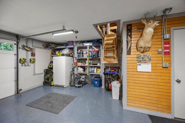 8007 5th St NE, Spring Lake Park, MN 55432 - garage with freestanding refrigerator