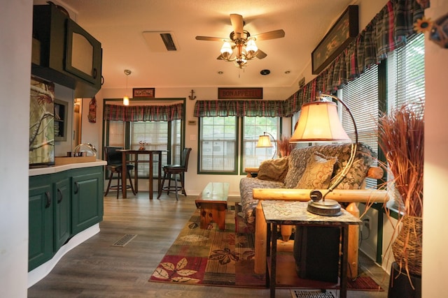 32741 Lakes Trl Unit 11A, Chisago Lake Twp, MN 55045 - living area featuring a ceiling fan and dark wood-style floors